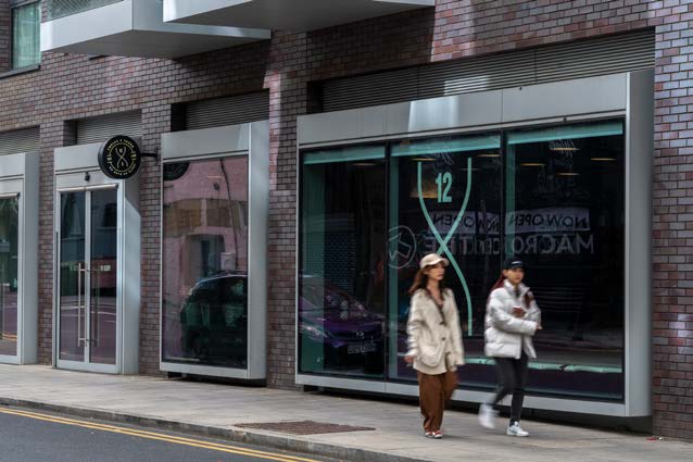 12x3's Alie Street street-level window and entrance